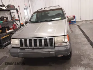 1998 Jeep Grand Cherokee Laredo with VIN 1J4GZ58S3WC343555, listed as a IAAI auction lot 41528943 with 219,146 mi miles. Bid and sale history available at carsss.com. Image 13.