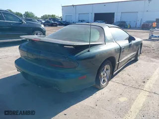 1996 Pontiac Firebird Formula with VIN 2G2FV22P5T2221912, listed as a IAAI auction lot 42004189 with 130,655 mi miles. Bid and sale history available at carsss.com. Image 4.