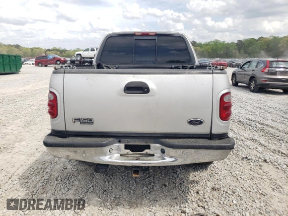 2002 Ford F-150 XLT with VIN 1FTRW07L12KA11845, listed as a Copart auction lot 51987205 with 282,865 mi miles and Salvage Title. Bid and sale history available at carsss.com. Image 6.