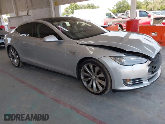 2013 Tesla Model S Performance with VIN 5YJSA1DP6DFP07999, listed as a IAAI auction lot 42284612 with 123,261 mi miles and . Bid and sale history available at DreamBid. Image 1.