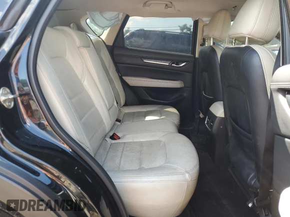 2018 Mazda CX-5 Grand Touring with VIN JM3KFBDM6J0345848, listed as a Copart auction lot 61587865 with 107,193 mi miles and Salvage title. Bid and sale history available at DreamBid. Image 11.
