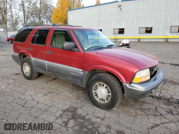 1999 GMC Jimmy SLE with VIN 1GKDT13W6X2508118, listed as a Copart auction lot 79761444 with 195,738 mi miles and Salvage Title. Bid and sale history available at carsss.com. Image 4.