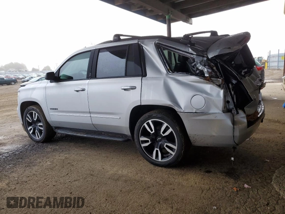 2019 Chevrolet Tahoe Premier with VIN 1GNSKCKJ9KR205249, listed as a Copart auction lot 41647065 with 46,854 mi miles and Salvage title. Bid and sale history available at DreamBid. Image 2.