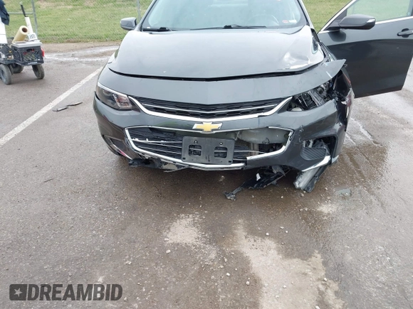 2018 Chevrolet Malibu LT with VIN 1G1ZD5ST2JF132801, listed as a IAAI auction lot 41887978 with 137,269 mi miles and . Bid and sale history available at carsss.com. Image 6.