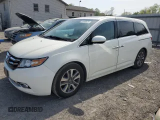 2015 Honda Odyssey Touring Elite with VIN 5FNRL5H96FB036607, listed as a Copart auction lot 54490625 with 91,171 mi miles and Salvage Title. Bid and sale history available at DreamBid. Image 1.