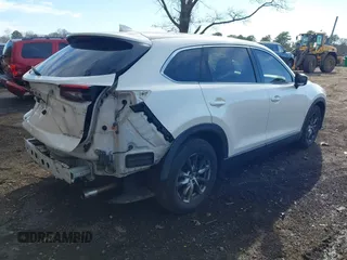 2016 Mazda CX-9 Touring with VIN JM3TCBCY4G0100511, listed as a IAAI auction lot 41811185 with 112,932 mi miles. Bid and sale history available at carsss.com. Image 4.