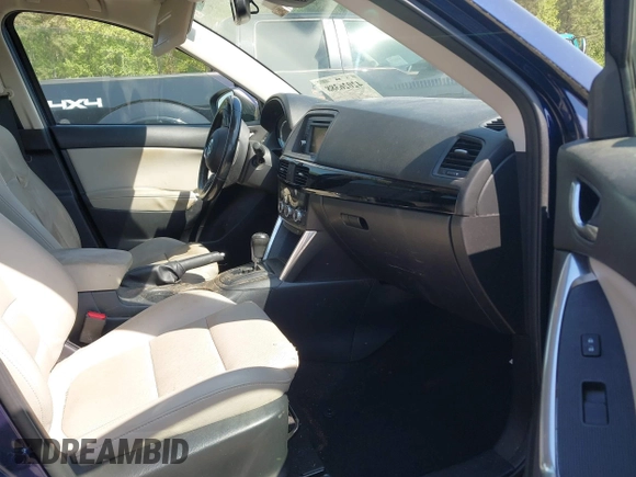 2014 Mazda CX-5 Grand Touring with VIN JM3KE4DYXE0342720, listed as a IAAI auction lot 42026388 with 114,072 mi miles and . Bid and sale history available at carsss.com. Image 5.