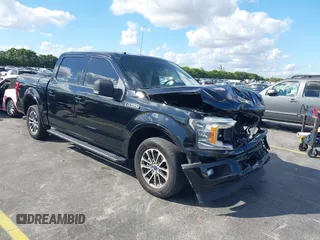 2018 Ford F-150 XL with VIN 1FTEW1CG9JFB38525, listed as a IAAI auction lot 41558418 with 143,983 mi miles. Bid and sale history available at carsss.com. Image 1.
