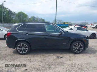 2016 BMW X5 xDrive35i z VIN 5UXKR0C55G0P26466, wystawiony jako IAAI lot #42005793 z przebiegiem 200 889 mil mil oraz . Historia ofert i sprzedaży dostępna na DreamBid. Obrazek 13.