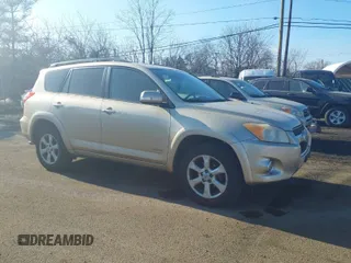 2010 Toyota RAV4 Ltd with VIN JTMDF4DV1A5020971, listed as a IAAI auction lot 41336888 with 214,838 mi miles. Bid and sale history available at carsss.com. Image 1.