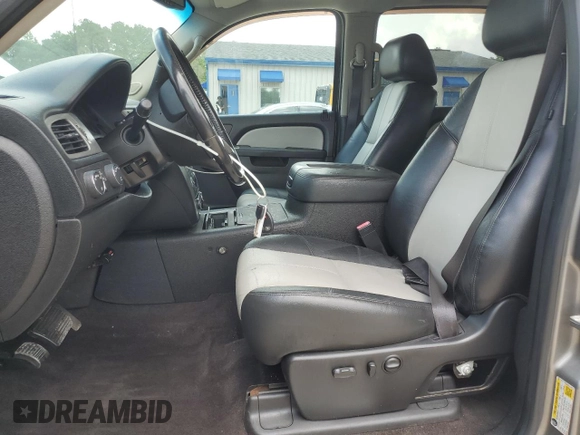 2013 GMC Sierra 1500 SLT with VIN 3GTP2WE25DG134770, listed as a Copart auction lot 59616535 with 212,304 mi miles and Salvage title. Bid and sale history available at DreamBid. Image 7.