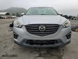 2016 Mazda CX-5 Grand Touring with VIN JM3KE2DY0G0852291, listed as a Copart auction lot 50665275 with 103,162 mi miles and Salvage Title. Bid and sale history available at carsss.com. Image 5.