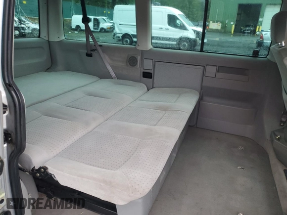 2001 Volkswagen EuroVan MV с VIN WV2MB47031H098986, выставлен на аукционе Copart как лот 77587294 с пробегом 161 046 миль миль и Чистый • Clean title. История ставок и продаж доступна на DreamBid. Изображение 11.