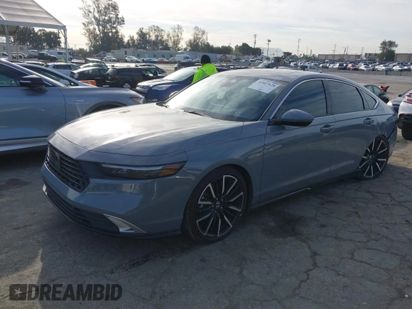2023 Honda Accord Touring with VIN 1HGCY2F81PA035053, listed as a IAAI auction lot 41807628 with 57,422 mi miles and . Bid and sale history available at DreamBid. Image 2.