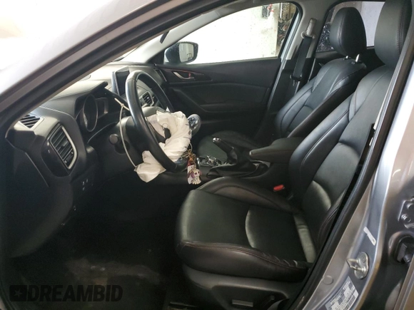 2015 Mazda 3 i Grand Touring z VIN 3MZBM1W7XFM155147, wystawiony jako Copart lot #58413555 z przebiegiem 111 318 mil mil oraz Szkoda całkowita • Salvage title. Historia ofert i sprzedaży dostępna na DreamBid. Obrazek 7.