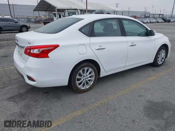 2018 Nissan Sentra S with VIN 3N1AB7AP6JY280214, listed as a IAAI auction lot 42173409 with 142,852 mi miles and . Bid and sale history available at DreamBid. Image 4.