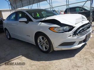 2018 Ford Fusion SE z VIN 3FA6P0LU7JR197261, wystawiony jako IAAI lot #42249577 z przebiegiem 106 975 mil mil oraz . Historia ofert i sprzedaży dostępna na DreamBid. Obrazek 1.