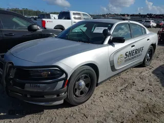 2021 Dodge Charger Police with VIN 2C3CDXAT8MH643477, listed as a IAAI auction lot 40688118 with 59,555 mi miles and . Bid and sale history available at DreamBid. Image 2.