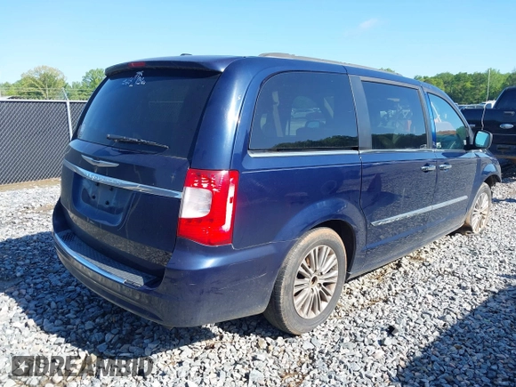 2013 Chrysler Town & Country Touring-L with VIN 2C4RC1CG7DR661162, listed as a IAAI auction lot 42026629 with 180,064 mi miles. Bid and sale history available at carsss.com. Image 4.