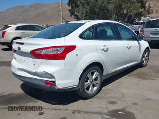2013 Ford Focus SE z VIN 1FADP3F25DL290446, wystawiony jako IAAI lot #42520571 z przebiegiem 158 020 mil mil oraz . Historia ofert i sprzedaży dostępna na DreamBid. Obrazek 4.
