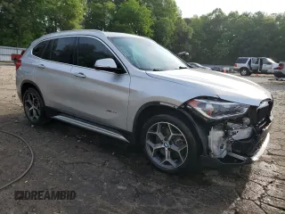 2017 BMW X1 xDrive28i z VIN WBXHT3Z34H4A53786, wystawiony jako Copart lot #54678575 z przebiegiem 86 312 mil mil oraz Szkoda całkowita • Salvage title. Historia ofert i sprzedaży dostępna na DreamBid. Obrazek 4.