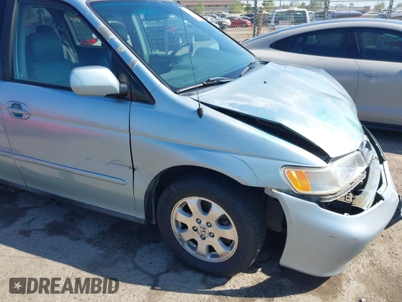 2003 Honda Odyssey EX-L with VIN 5FNRL18973B148675, listed as a IAAI auction lot 41992952 with 232,013 mi miles and . Bid and sale history available at DreamBid. Image 19.
