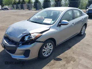 2012 Mazda 3 i Touring with VIN JM1BL1V85C1623374, listed as a IAAI auction lot 42106820 with 117,262 mi miles and . Bid and sale history available at carsss.com. Image 2.