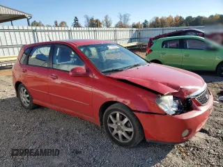 2005 Kia Spectra with VIN KNAFE161455146328, listed as a Copart auction lot 77605534 with 110,605 mi miles and Salvage Title. Bid and sale history available at carsss.com. Image 4.