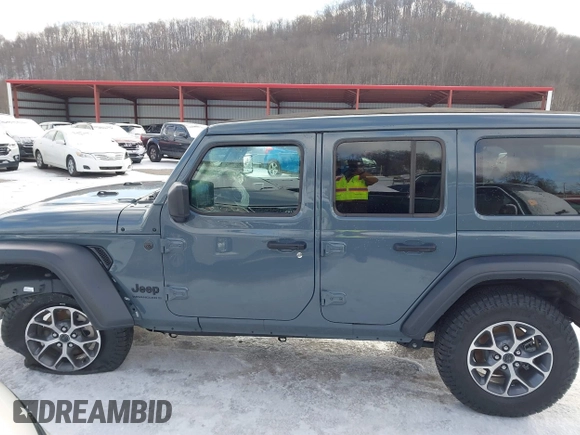 2024 Jeep Wrangler Sport S with VIN 1C4PJXDN2RW306332, listed as a IAAI auction lot 41036573 with 1,785 mi miles and . Bid and sale history available at DreamBid. Image 14.