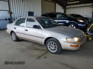 1997 Toyota Corolla with VIN 1NXBA02E4VZ577026, listed as a Copart auction lot 66184515 with 201,324 mi miles and Clean title. Bid and sale history available at DreamBid. Image 4.
