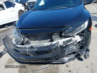 2021 Honda Civic Sport with VIN 2HGFC2F81MH529499, listed as a IAAI auction lot 41836215 with 55,833 mi miles and . Bid and sale history available at DreamBid. Image 12.