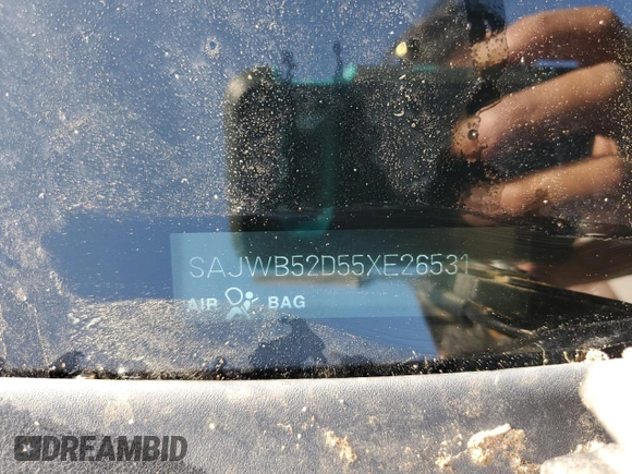 2005 Jaguar X-Type z VIN SAJWB52D55XE26531, wystawiony jako Copart lot #50909445 z przebiegiem 158 861 mil mil oraz Szkoda całkowita • Salvage title. Historia ofert i sprzedaży dostępna na DreamBid. Obrazek 12.