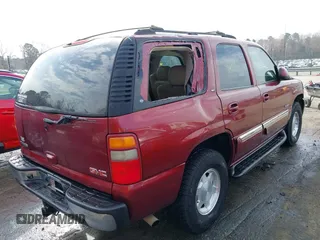 2003 GMC Yukon SLT with VIN 1GKEK13Z73R199374, listed as a IAAI auction lot 41840225 with 230,235 mi miles. Bid and sale history available at carsss.com. Image 4.