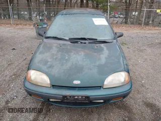 1996 Geo Metro z VIN 2C1MR2290T6780279, wystawiony jako IAAI lot #41792946 z przebiegiem 160 002 mil mil oraz . Historia ofert i sprzedaży dostępna na DreamBid. Obrazek 6.