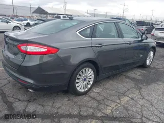 2016 Ford Fusion Energi SE Luxury with VIN 3FA6P0PU6GR165971, listed as a IAAI auction lot 41417233 with 118,240 mi miles. Bid and sale history available at carsss.com. Image 4.