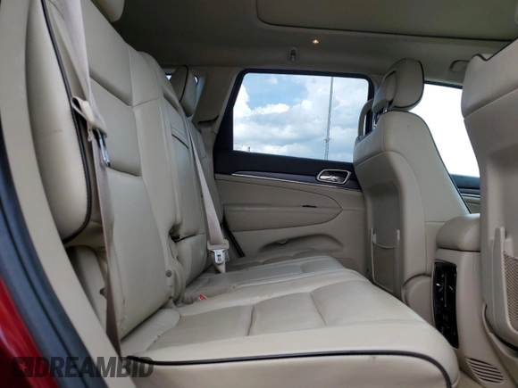 2017 Jeep Grand Cherokee Overland with VIN 1C4RJFCG5HC874130, listed as a Copart auction lot 65324695 with 101,588 mi miles and Salvage title. Bid and sale history available at DreamBid. Image 11.
