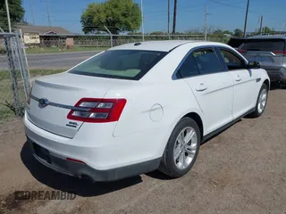 2015 Ford Taurus SEL z VIN 1FAHP2E8XFG196270, wystawiony jako IAAI lot #42007068 z przebiegiem 150 093 mil mil oraz . Historia ofert i sprzedaży dostępna na DreamBid. Obrazek 4.