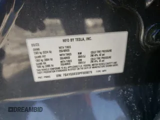 2023 Tesla Model Y Long Range with VIN 7SAYGDEE8PF889879, listed as a Copart auction lot 46115535 with 17,818 mi miles and Salvage Title. Bid and sale history available at DreamBid. Image 12.