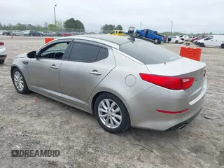 2015 Kia Optima EX with VIN 5XXGN4A76FG409159, listed as a IAAI auction lot 41937814 with 120,641 mi miles. Bid and sale history available at carsss.com. Image 3.