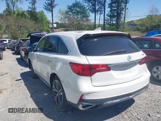 2020 Acura MDX w/Technology Pkg with VIN 5J8YD3H56LL013803, listed as a IAAI auction lot 41983696 with 58,346 mi miles. Bid and sale history available at carsss.com. Image 3.