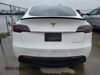 2022 Tesla Model Y Long Range with VIN 7SAYGDEE1NF491488, listed as a Copart auction lot 49266945 with 44,703 mi miles and Salvage Title. Bid and sale history available at carsss.com. Image 6.