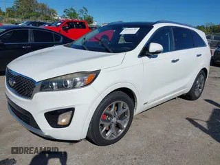 2016 Kia Sorento SX z VIN 5XYPKDA5XGG173541, wystawiony jako IAAI lot #40916121 z przebiegiem Nie podano mil oraz . Historia ofert i sprzedaży dostępna na DreamBid. Obrazek 2.