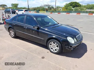 2003 Mercedes-Benz E-Class 3.2L with VIN WDBUF65J93A145071, listed as a IAAI auction lot 41883660 with 91,710 mi miles. Bid and sale history available at carsss.com. Image 1.