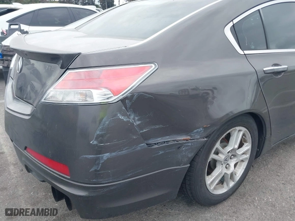 2009 Acura TL Tech with VIN 19UUA86519A014157, listed as a IAAI auction lot 42058423 with 201,403 mi miles. Bid and sale history available at carsss.com. Image 12.