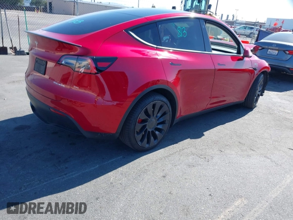 2021 Tesla Model Y Performance with VIN 5YJYGDEF4MF092062, listed as a IAAI auction lot 41583793 with 57,194 mi miles and . Bid and sale history available at DreamBid. Image 4.