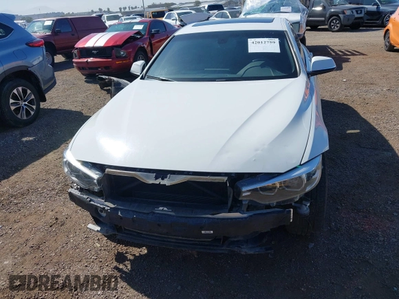 2019 BMW 4 Series 430i with VIN WBA4J1C54KBM18190, listed as a IAAI auction lot 42012759 with 73,598 mi miles. Bid and sale history available at carsss.com. Image 13.