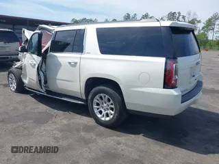 2015 GMC Yukon XL SLT with VIN 1GKS1HKC0FR154518, listed as a IAAI auction lot 41905683 with 162,482 mi miles. Bid and sale history available at carsss.com. Image 3.