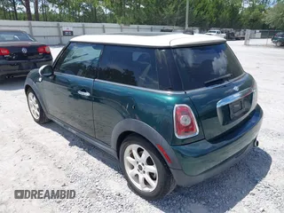 2010 MINI Hardtop with VIN WMWMF3C5XATZ23107, listed as a IAAI auction lot 42732300 with 100,747 mi miles and . Bid and sale history available at DreamBid. Image 3.