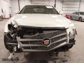 2009 Cadillac CTS AWD w/1SB with VIN 1G6DT57VX90110769, listed as a IAAI auction lot 41696744 with 164,127 mi miles. Bid and sale history available at carsss.com. Image 6.