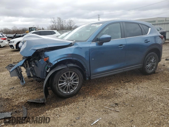 2017 Mazda CX-5 Touring z VIN JM3KFBCL2H0129000, wystawiony jako Copart lot #52107005 z przebiegiem 55 411 mil mil oraz Szkody całkowita. Historia ofert i sprzedaży dostępna na DreamBid. Obrazek 1.